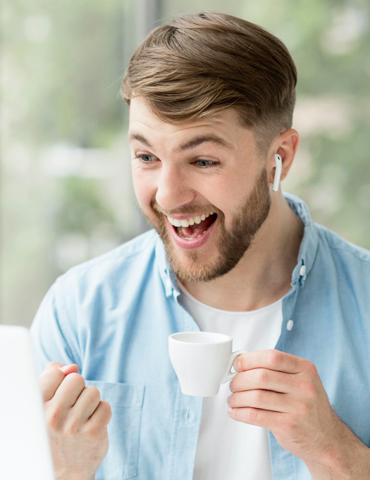 A man running outside with airpods in the ears.
